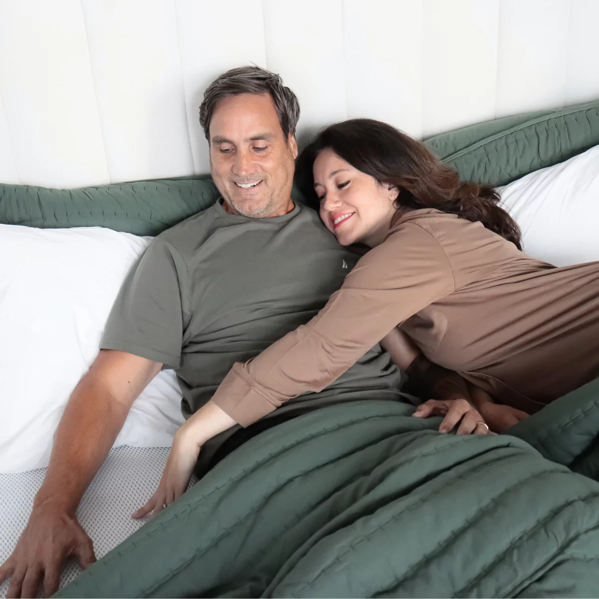Couple relaxing on a Perfectly Snug bed